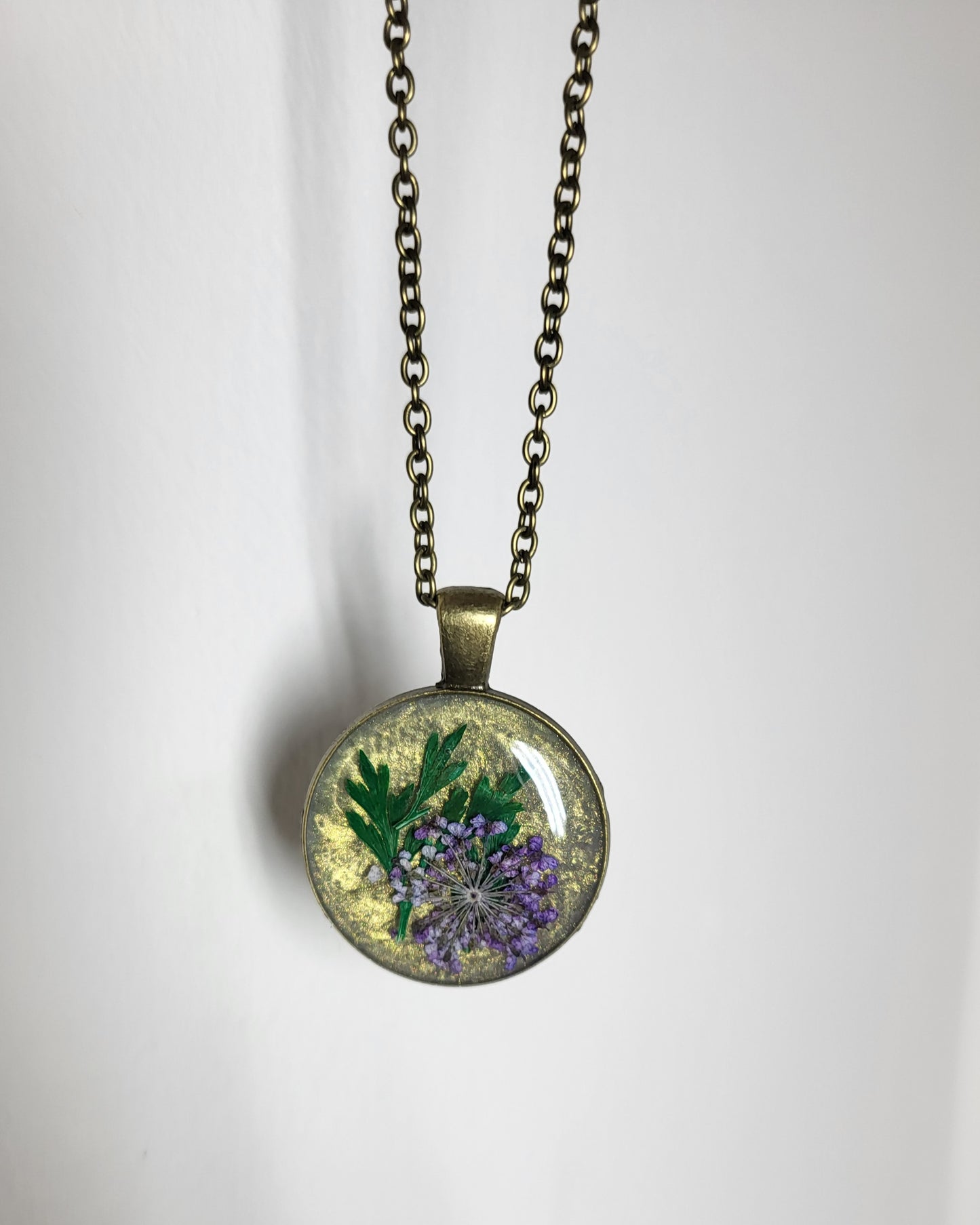 Antique bronze purple wildflower pendant